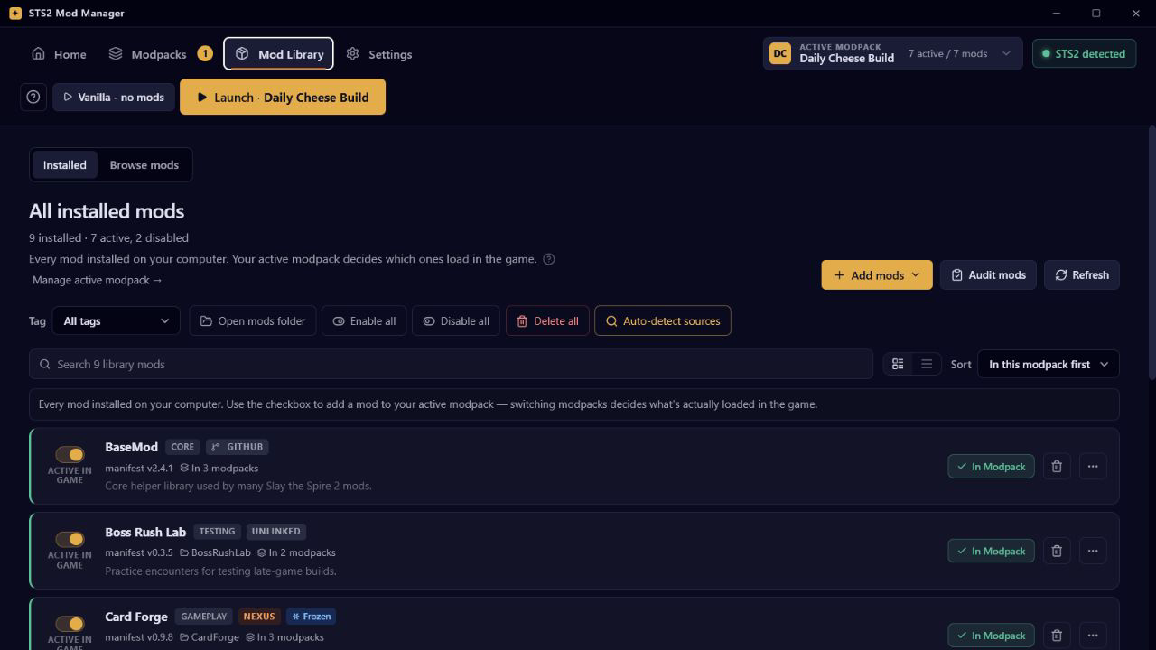 Mod Library view with fake installed mods, source labels, tags, and audit controls